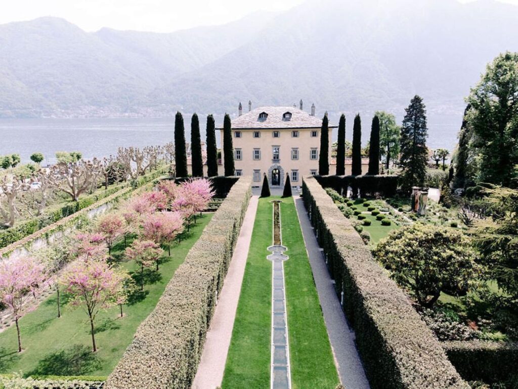 Grand staircase and historic gardens at Villa Balbiano overlooking Lake Como in Ossuccio.