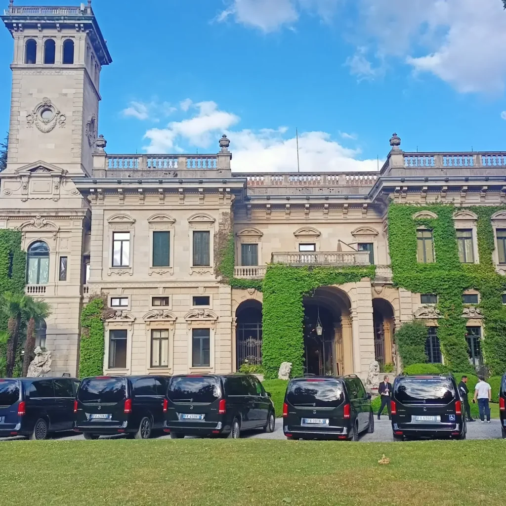 Mercedes-Benz chauffeur fleet positioned at a luxury venue for VIP delegations, private events and coordinated group transportation in Northern Italy.