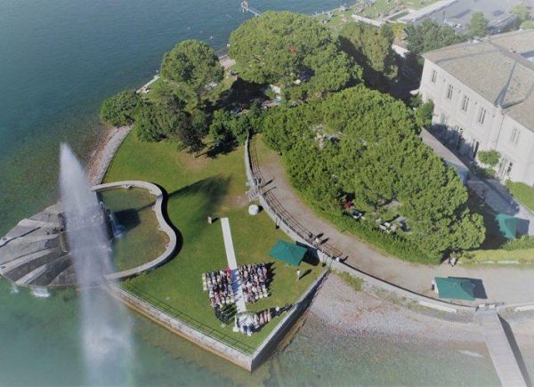 Villa Geno overlooking Lake Como with elegant Neo-Classical architecture and lakeside gardens.